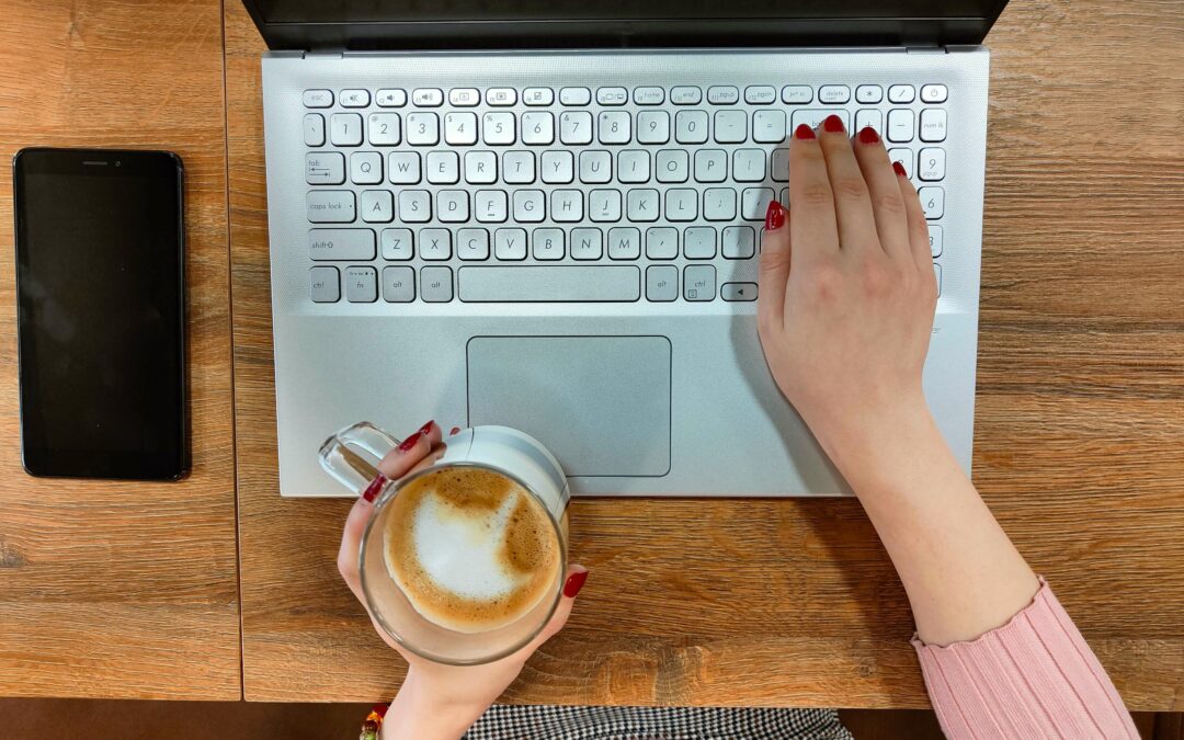 Woman typing on computer to visit Mental Health Resources Website